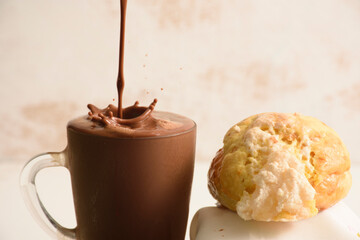 Sweet bun and chocolate drink