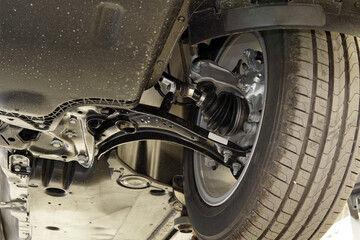 Elements and structure of the suspension of a modern car. Selected focus. Car service, repair,...