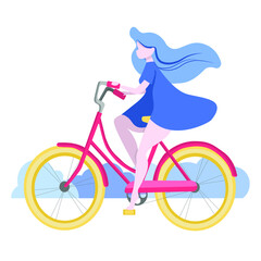 A girl in a blue dress rides a bicycle