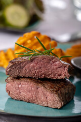 steak with potato lattices