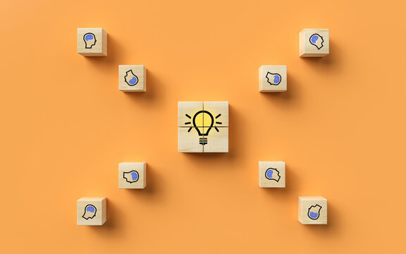 cubes showing a brainstorming session on orange background