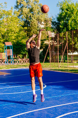 Obraz premium Basketball player jump shooting and playing basketball.