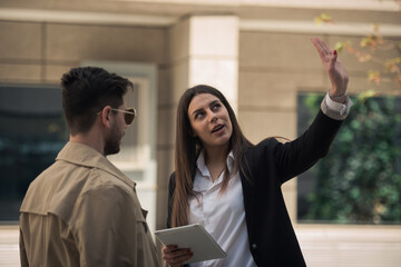 Showing the location to her partner