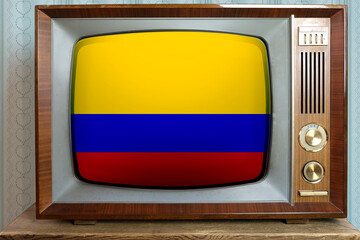 old tube vintage TV with the national flag of Colombia on the screen, stylish 60s interior, the...