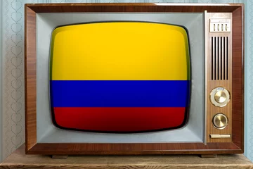Foto op Canvas old tube vintage TV with the national flag of Colombia on the screen, stylish 60s interior, the concept of eternal values ​​on television, global world trade, politics, retro technologies, news © kittyfly