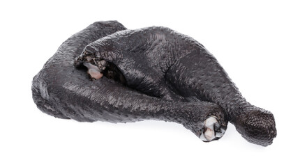 fresh black chicken thighs isolated on white background