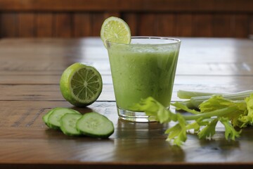 Celery cucumber mix healthy drink on table with veggies