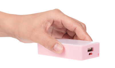 Hand holding DIY Power Bank isolated on white background.