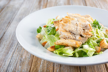 A view of a chicken Caesar salad.