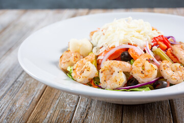 A view of a shrimp antipasto salad.