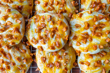 Sausage bread on wooden table in coffee and bakery shop in Champasak town, Southern Laos