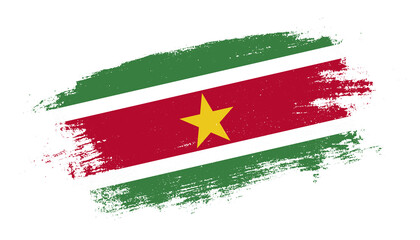 Flag of Suriname country on brush paint stroke trail view. Elegant texture of national country flag
