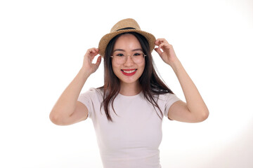 Obraz na płótnie Canvas Beautiful young south east Asian woman wearing eyewear golden frame glasses hat pose fashion style white background look around copy text space hands on hat