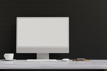Computer monitor with mock-up screen on marble desk with stationery in black wall background, 3D rendering