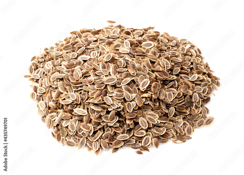 Wall mural pile of dill seeds closeup on white