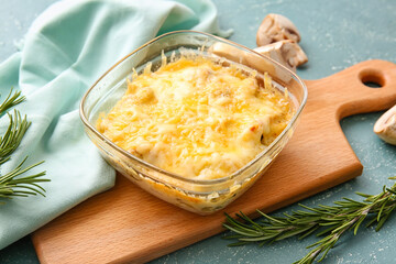 Baking dish with tasty julienne on color background