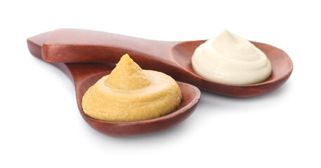 Spoons with mustard and mayonnaise on white background