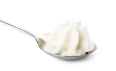 Spoon with whipped cream on white background