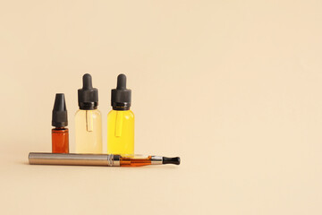 Electronic cigarette with oil on light background