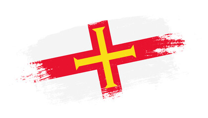 Flag of Guernsey country on brush paint stroke trail view. Elegant texture of national country flag