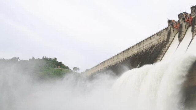 water release at spillway Compacted Concrete Dam, Khun Dan Prakan Chon dam
