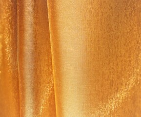 Golden organza fabric with beautiful pleats. Solid satin, satin background.