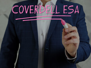 Attractive Merchant with marker writing COVERDELL ESA education savings account