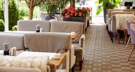 Restaurant or cafe with cozy interior. View of modern dinning room interior