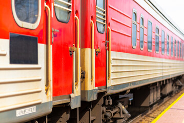 Railroad tracks and red locomotive in the town.old train locomotive.close-up.