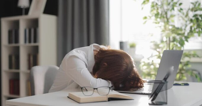 Woman tired after laptop