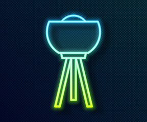 Glowing neon line Floor lamp icon isolated on black background. Vector