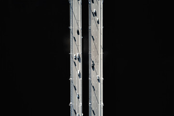 Cars traffic on bridge over the river, aerial view. Top view of bridge over Sozh river in Gomel, Belarus