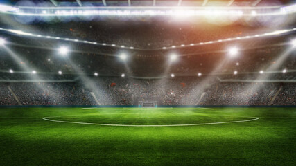 sport background - big green field in soccer stadium. ready for game