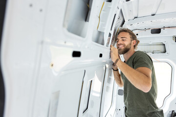 Man working on a camper van project