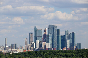 Fototapeta na wymiar View to skyscrapers of Moscow city in summer. Futuristic cityscape, concept of russian economy
