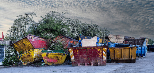 Collection of old used waste skips