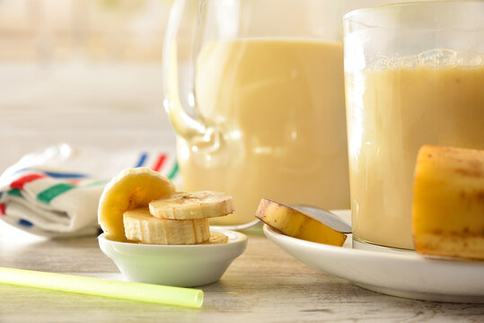 Healthy Breakfast With Banana Milk Shake In Containers Close Up