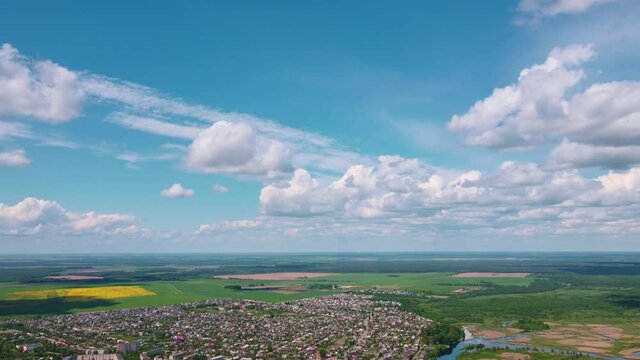 Cars traffic on bridge over the river in city, aerial view. Top view of bridge over Sozh river in Gomel, Belarus. Birds eye view cityscape