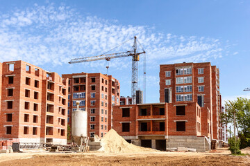 Fototapeta premium Construction site with a tower crane. Concrete unit on a construction site.