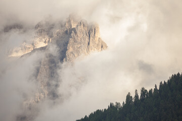 The northern side of Sella group among the clouds from the Val Gardena area