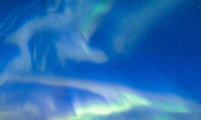 Fototapeta na wymiar Northern lights or Aurora borealis in the sky