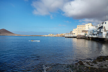 Tranquil shore of the picturesque Canarian town popular for its annual watersports competitions, traditional cuisine and bohemian atmosphere, El Medano, Tenerife, Canary Islands, Spain