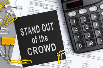 Stand out of the crowd - concept of text on sticky note. Work and study concept