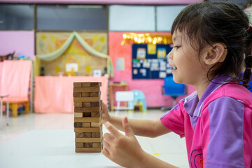 Hearing impaired children Playing wooden blocks game