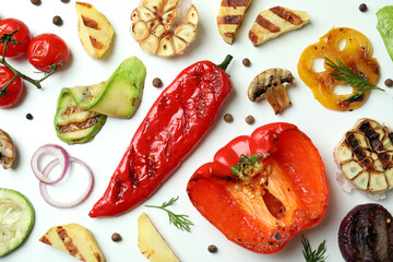 Tasty grilled vegetables on white background, close up