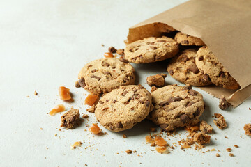 Cookies with caramel on white textured background