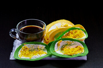 mini crispy crepe with cup of black coffee