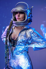 Nude cosmic woman in silver suit and helmet