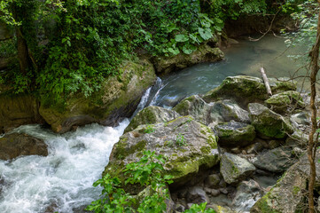 river in the woods coming from the waterfall of the marmore