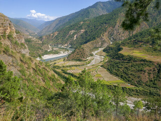 Landscape view of Drangme Chhu river valley with beautiful rice terraces, near Trashigang, eastern Bhutan